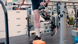 A study participant with the bone-integrated prosthesis dodges obstacles in their path (Image credit: MIT)